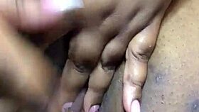 ebony girl fingers herself till she squirts everywhere