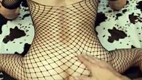 A wife and her husband's friend in a scene.