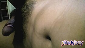 Chubby hairy ladyboy wanks her cock and cums semen.