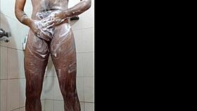 dude gets off in the shower while bathing alone.