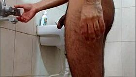 dude gets off in the shower while bathing alone.