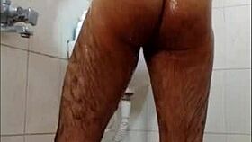 dude gets off in the shower while bathing alone.