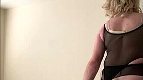 Long thick dildo stretches this tranny's hole! She writhes wildly on the counter in lingerie.