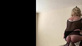 Long thick dildo stretches this tranny's hole! She writhes wildly on the counter in lingerie.