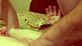 the mature woman is playing with toys and getting spanked