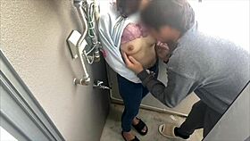 excited japanese amateur couple starts banging on the balcony