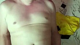 The slave worships his mistress's feet before she tramples and crushes his balls.