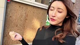 Beautiful asian wife enjoys a quiet evening at home