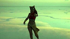 Mature amateurs dance under pink sky