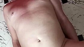 The slave worships his mistress's feet before she tramples and crushes his balls.