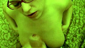 Busty slut with glasses hungrily sucks my cock in the bedroom