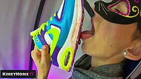 a european amateur crushes food with dirty feet in sneakers