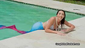 By the pool, a wet mermaid rides a monster cock passionately