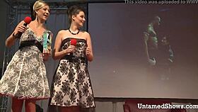 sexy blonde dances striptease on stage with ripped clothes