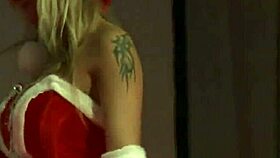 sexy blonde dances striptease on stage with ripped clothes