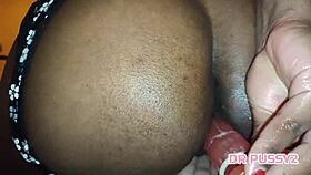 Bent over ebony with big tits and tattoos takes dildo in assfucking