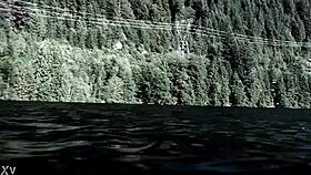 Blonde girl in bikini swims in supernatural setting