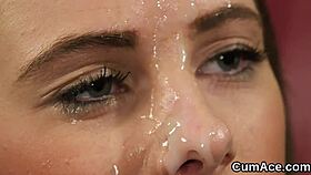 Flirty honey gets cumshot on her face sucking all the jizz