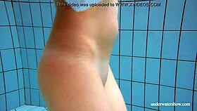 Big tits redhead Lola strips nude underwater in steamy display