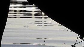 guy pissing in the lake outdoors