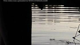 guy pissing in the lake outdoors
