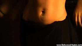 Beautiful brunette chick from bollywood undressing and dancing nude