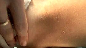 Her big toy teases while she strips