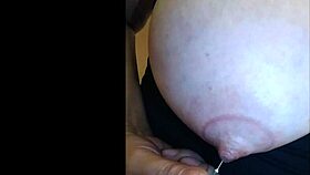 Watch the needle piercing the nipples in detail
