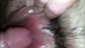 He loves playing with her hairy pussy