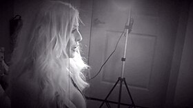 Check out this blonde's see-thru bikini cam show with big tits