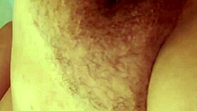 this hot girl moans loudly while masturbating her natural tits and cumming hard in this homemade video