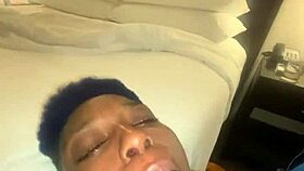 Ebony woman performs oral on large man in homemade setting