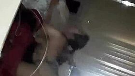 a homemade video shows a latina brunette bent over in a scene