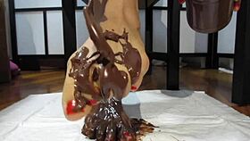 My feet with varnished nails are all covered in chocolate cream