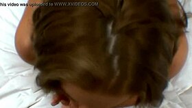 The pretty babe rubs a dick in her face before deepthroating