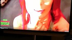 Tattooed redhead masturbates intensely while watching pornstar cumshot