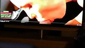 Tattooed redhead masturbates intensely while watching pornstar cumshot