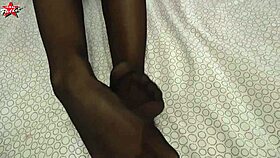 Texas Patti Gives Nylon Footjob Cumshot