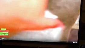 Tattooed redhead masturbates intensely while watching pornstar cumshot