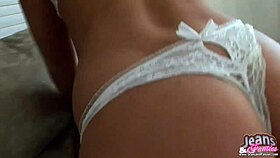 This emo girl with short hair teases in tight blue jeans, clothes ripping off