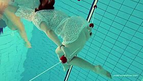 White dressed babe Katy Soroka dives underwater tight