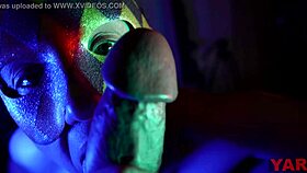 masked adult bites penis hed and foreskin for blowjob.