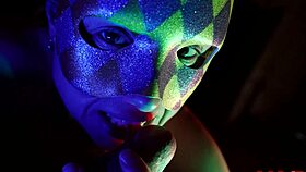 masked adult bites penis hed and foreskin for blowjob.