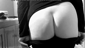 mature woman teases with her curvy ass and full tits