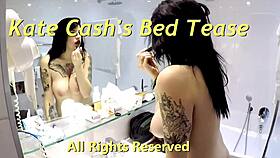 kate teases on bed with her natural tits.