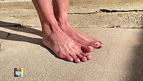 outdoor toe wiggle by sexy model near neighbors