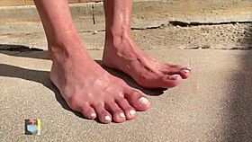 outdoor toe wiggle by sexy model near neighbors