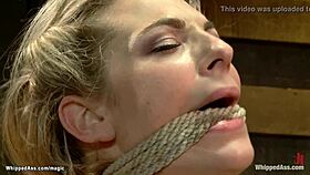 tied blond lesbian gets butt fucked in bdsm scene