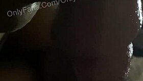 Mature ebony milf gives sloppy blowjob to big cock, spitting and wetting it suggestively.