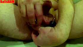 the mistress kicks balls in the garage, making the cum juice flow